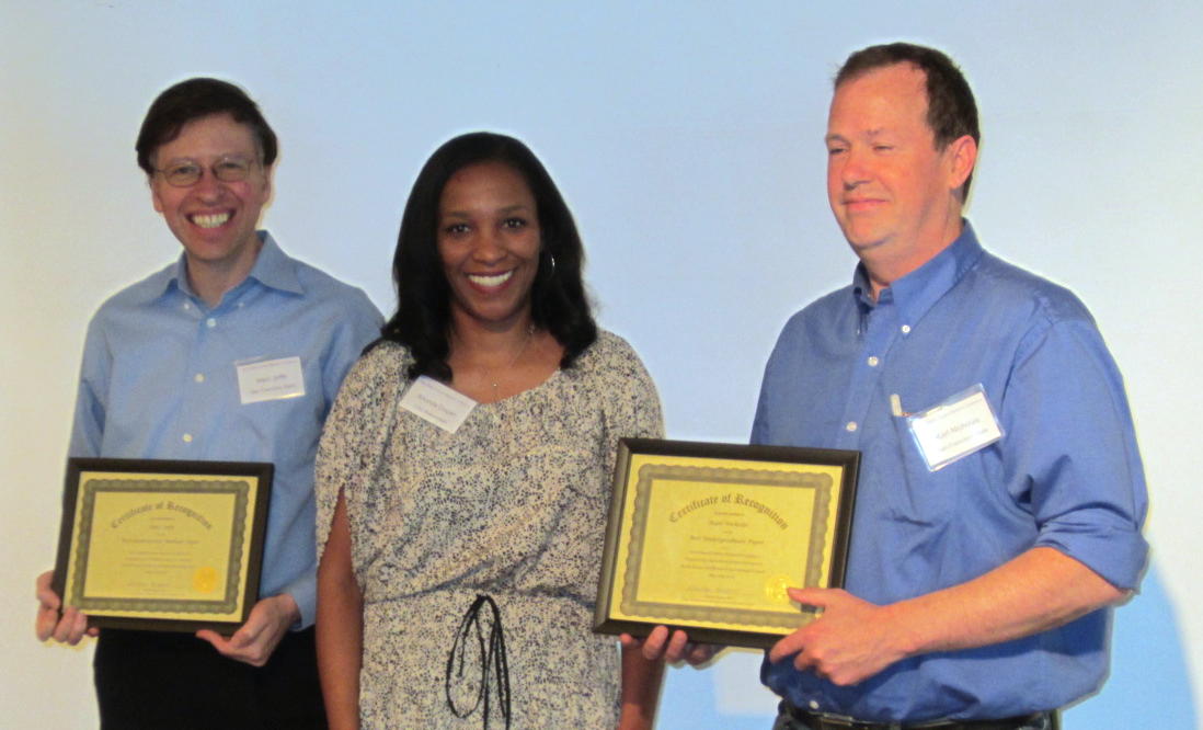 2013 Best Paper Award Winners , Marc Joffe (left) and Karl Nicholas (right), shown with 2012-2013 SSRIC Chair, Dr. Rhonda Dugan; not shown, Kathryn Gruszecki